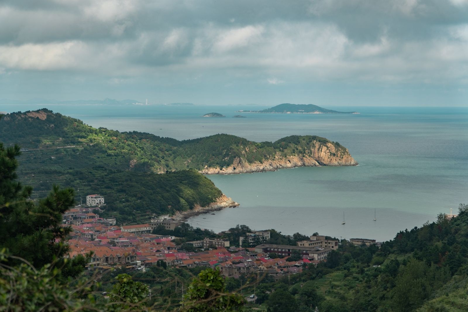 A resort bay with a calm cove and coastal views