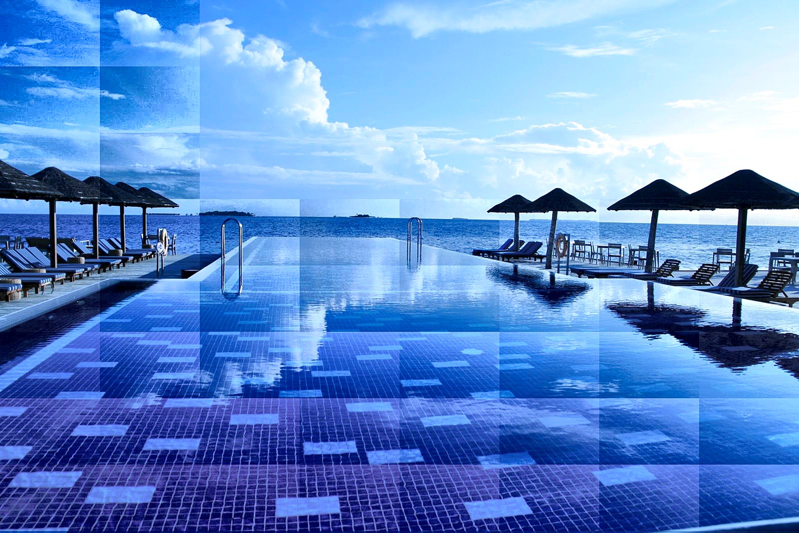 The infinity pool at InterContinental Shenzhen Dameisha, spilling toward the South China Sea.