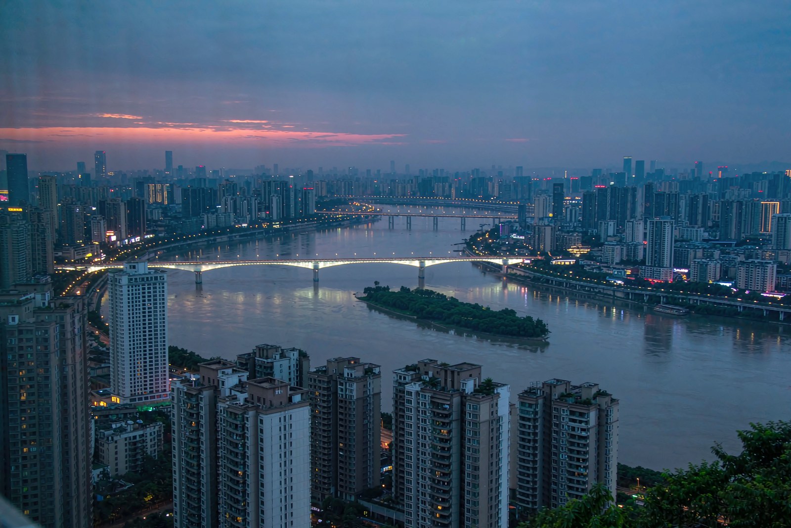 Looking down the Xiang River from a hotel window at dusk