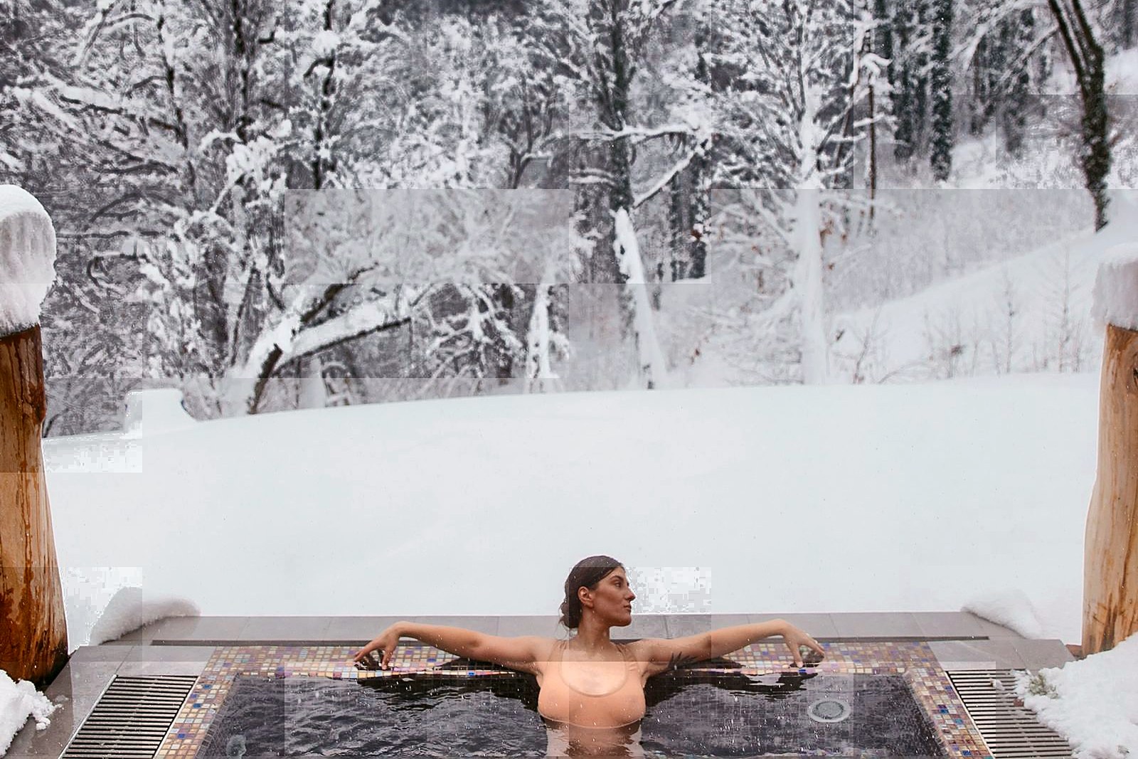 The hillside radon hot-spring pools at Xilegu, steaming against the cool mountain air.