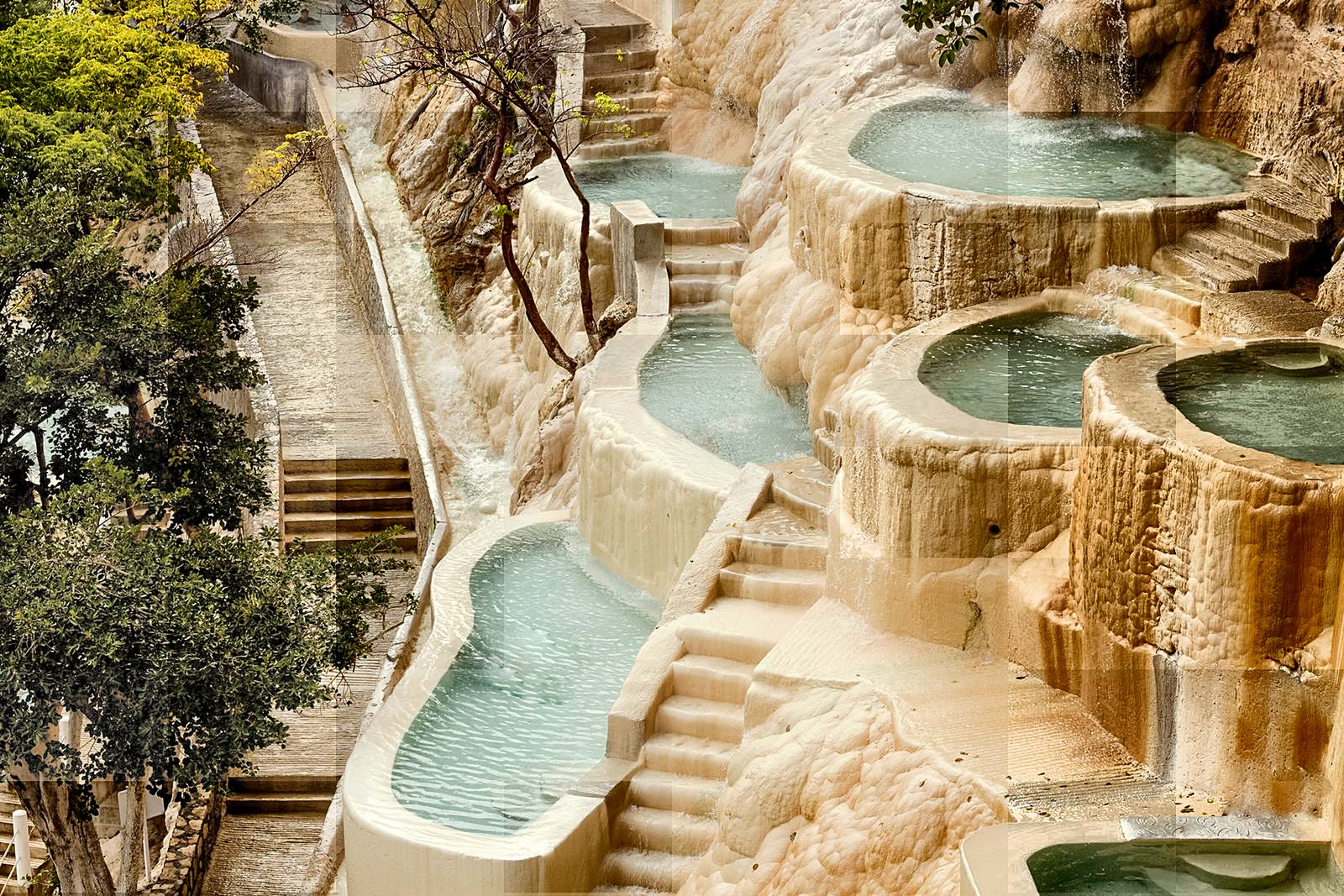 A private terrace soaking pool at a Xilegu villa, lit by evening lanterns.